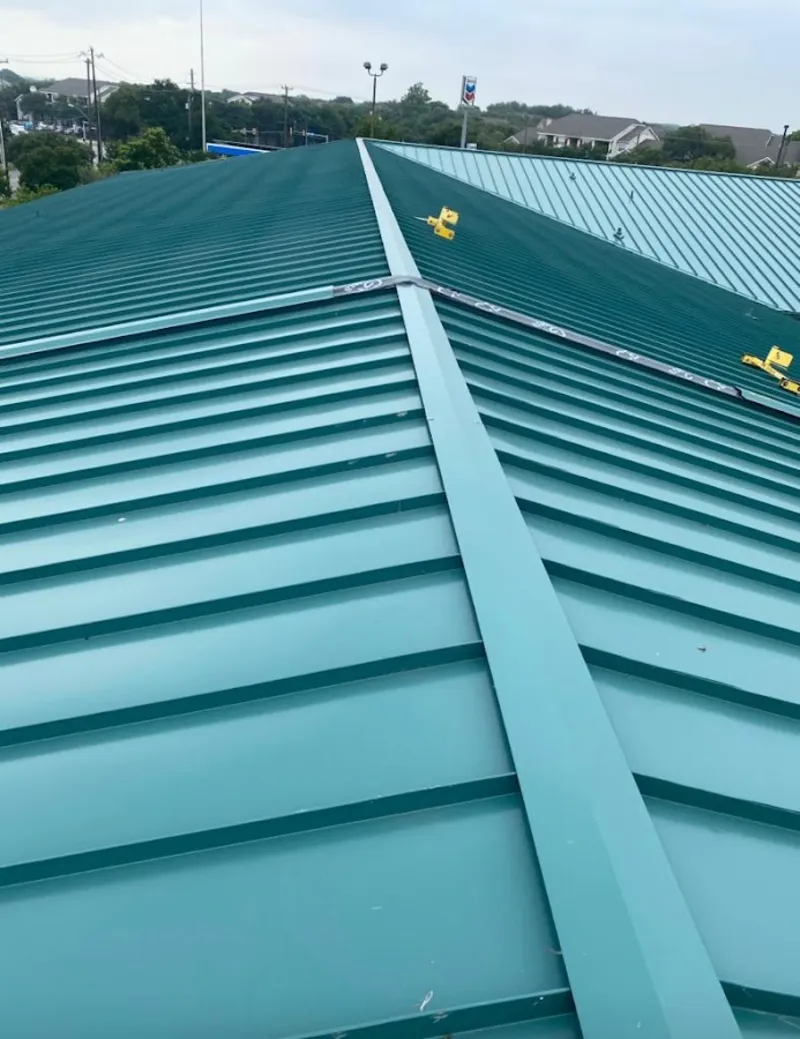Green commercial metal roof ridge and valley for Metal Roof Repair in Orange Beach